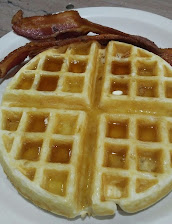 Belgian Waffle With Syrup And Grilled Bacon