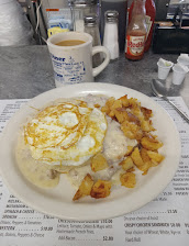 Biscuits And Gravy With Two Eggs Over